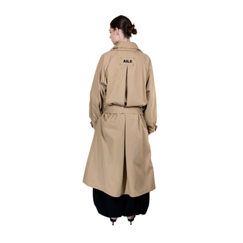 BEIGE TRENCH COAT - "THE BED".