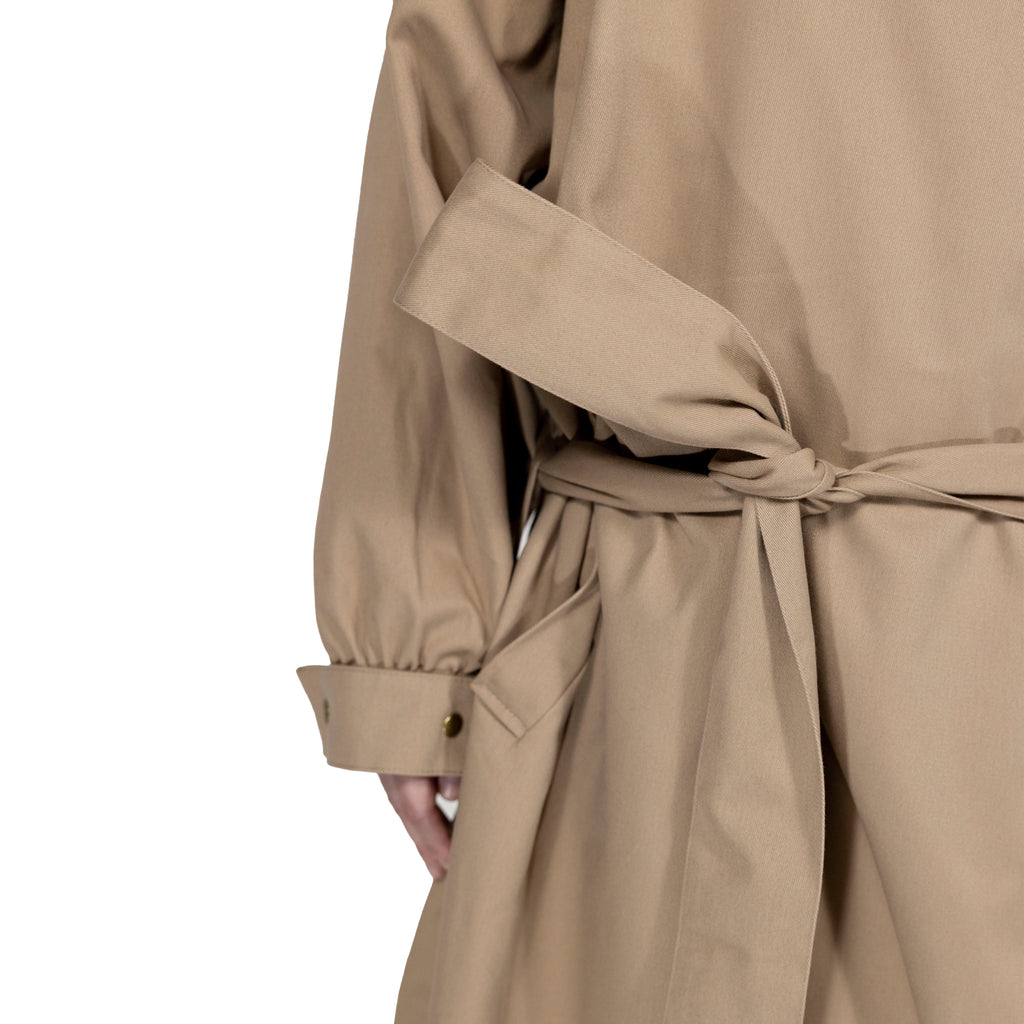 BEIGE TRENCH COAT - "THE BED".