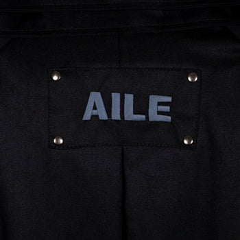 BLACK TRENCH COAT - "THE BED".