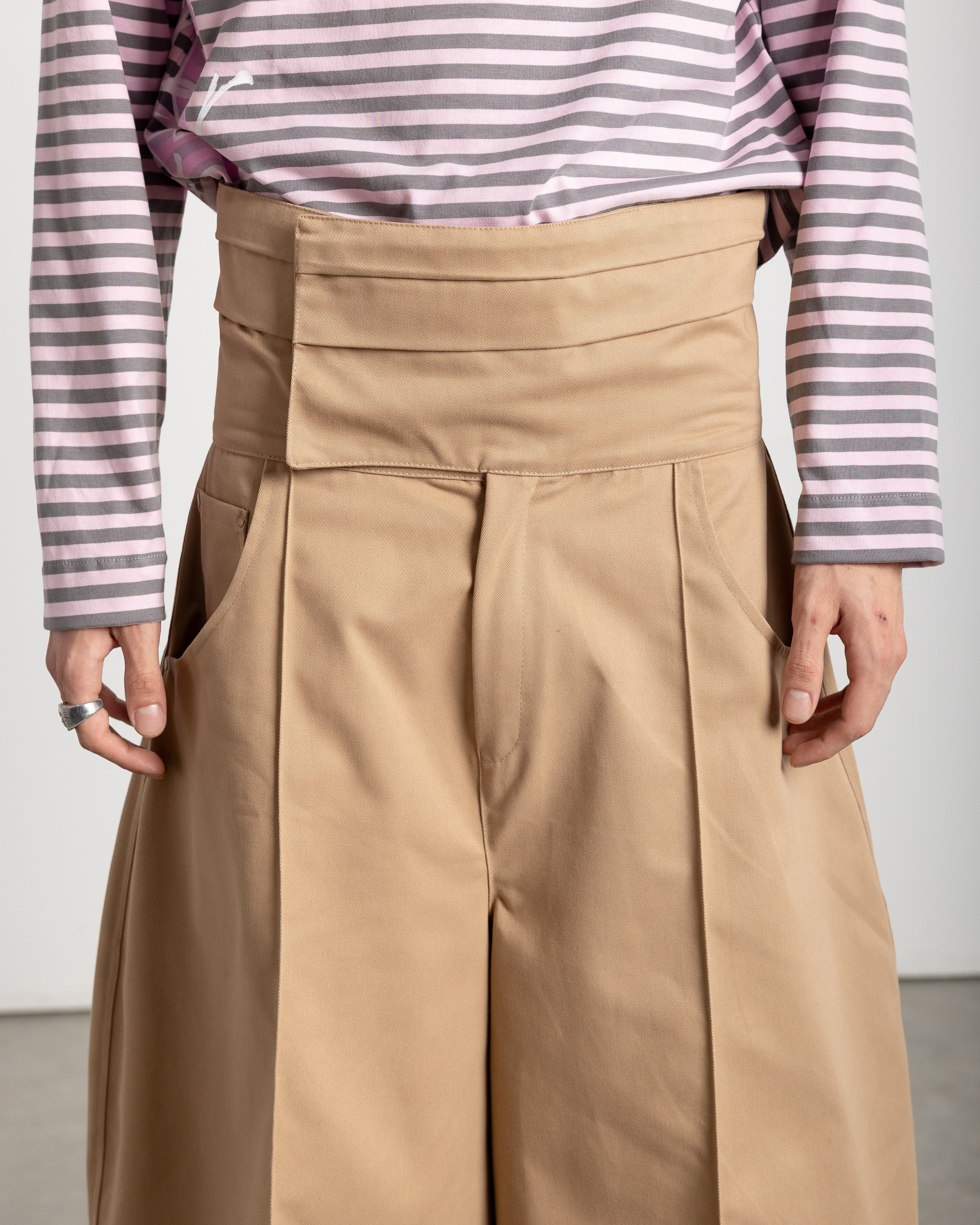 All of our garments are designed, patterned, cut, sewn, and finished by hand in a small atelier in Vigo, crafted by professionals with over 25 years of experience in the fashion industry.AILE