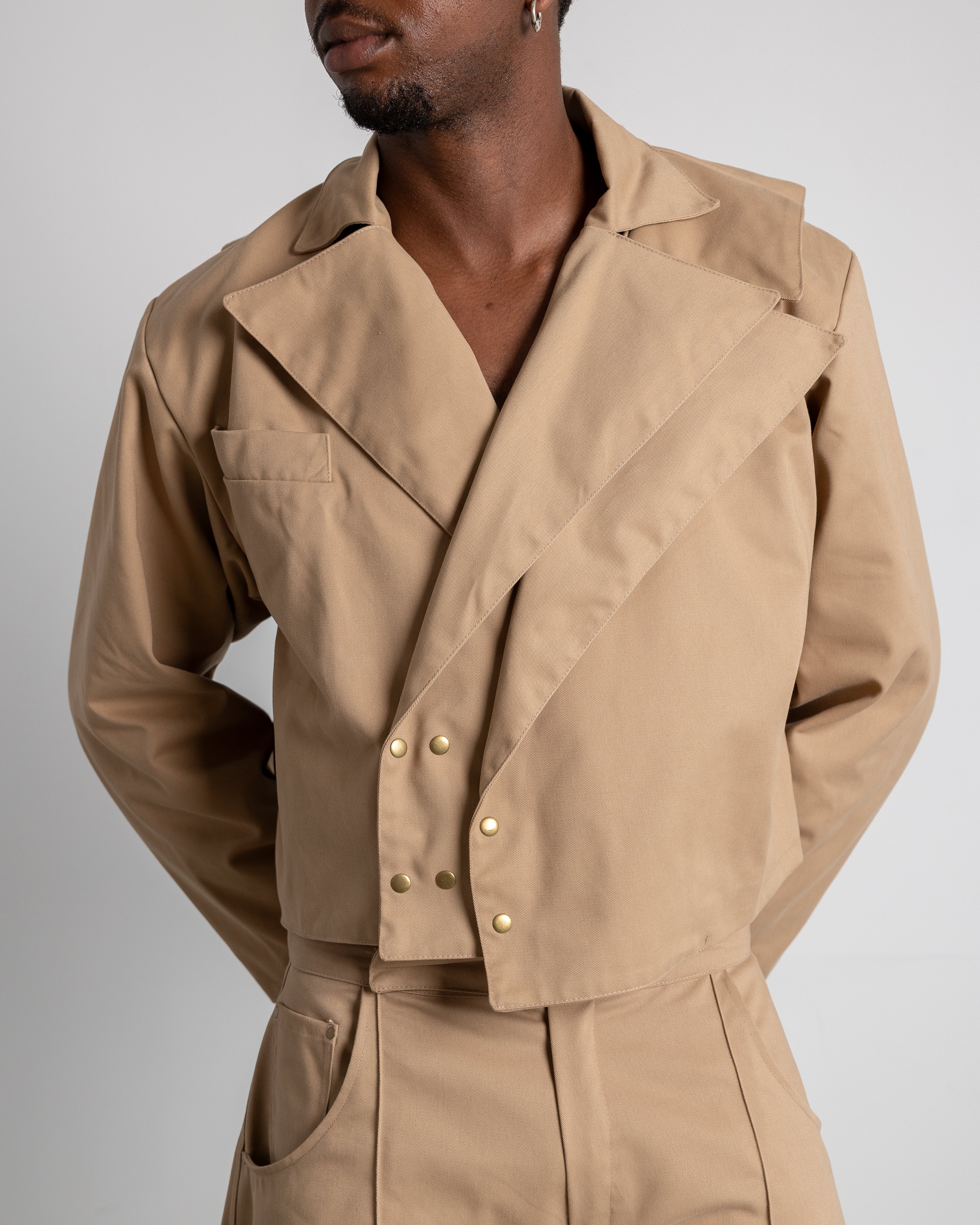 All of our garments are designed, patterned, cut, sewn, and finished by hand in a small atelier in Vigo, crafted by professionals with over 25 years of experience in the fashion industry.