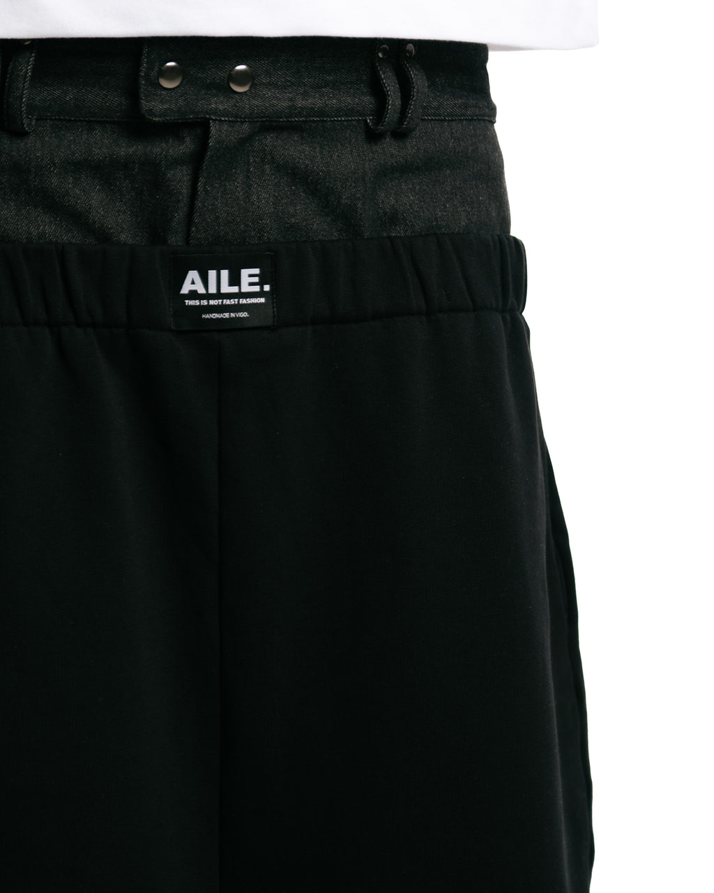 Detail  with double denim waistband in black.AILE