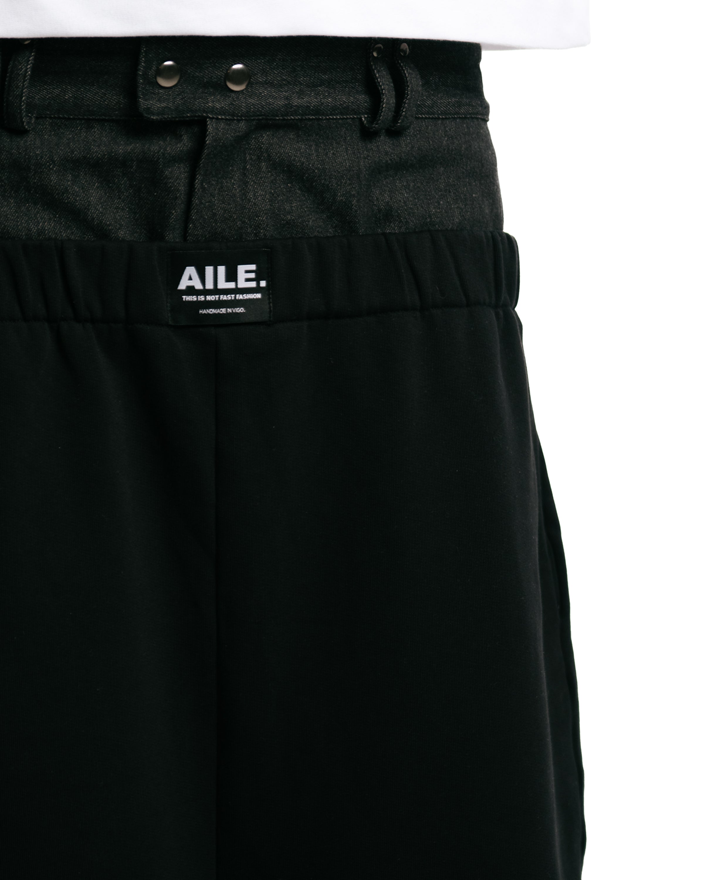 Detail  with double denim waistband in black.AILE