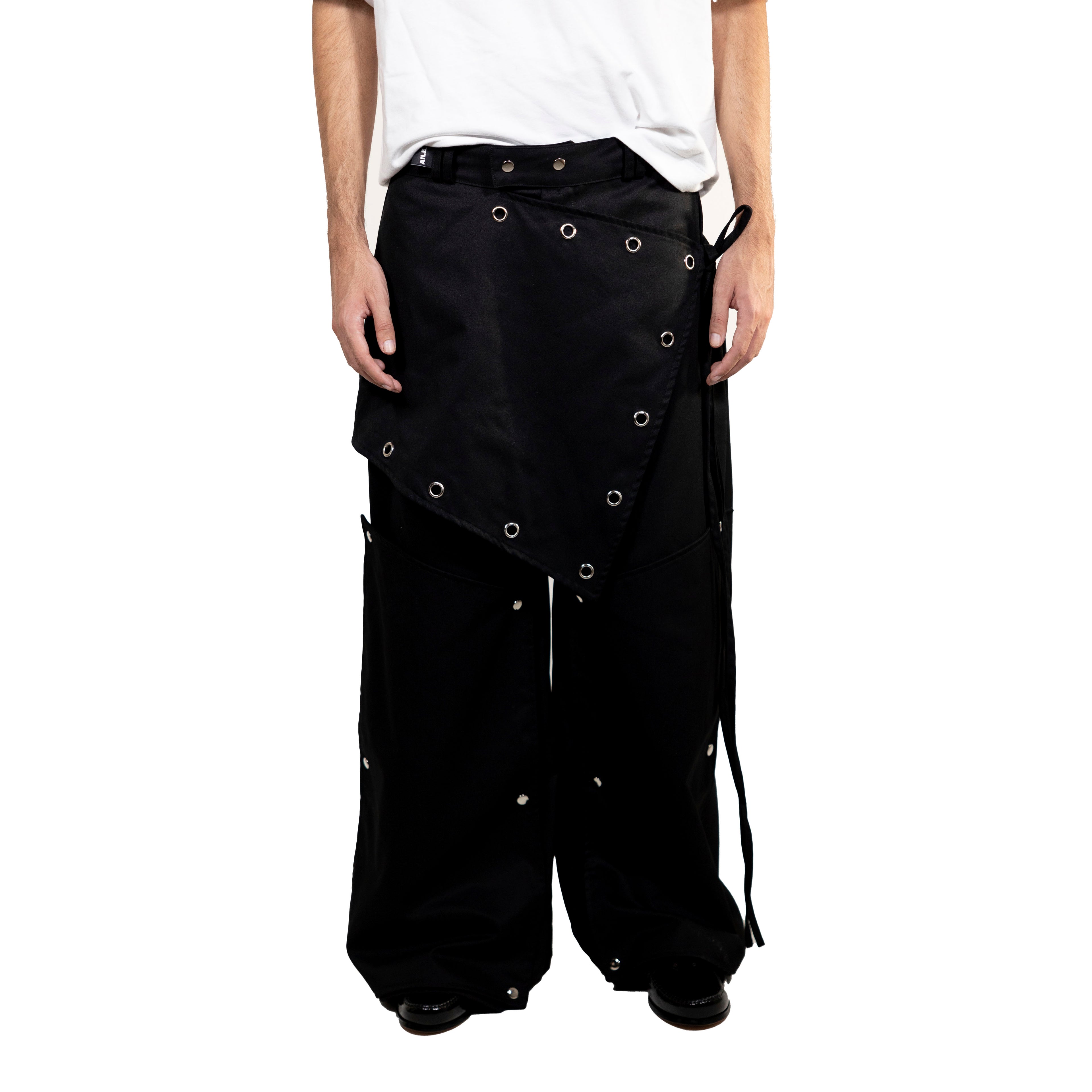 Pantalón largo con falda superpuesta y perneras extraíbles. Hecho a mano en Vigo, Galicia.