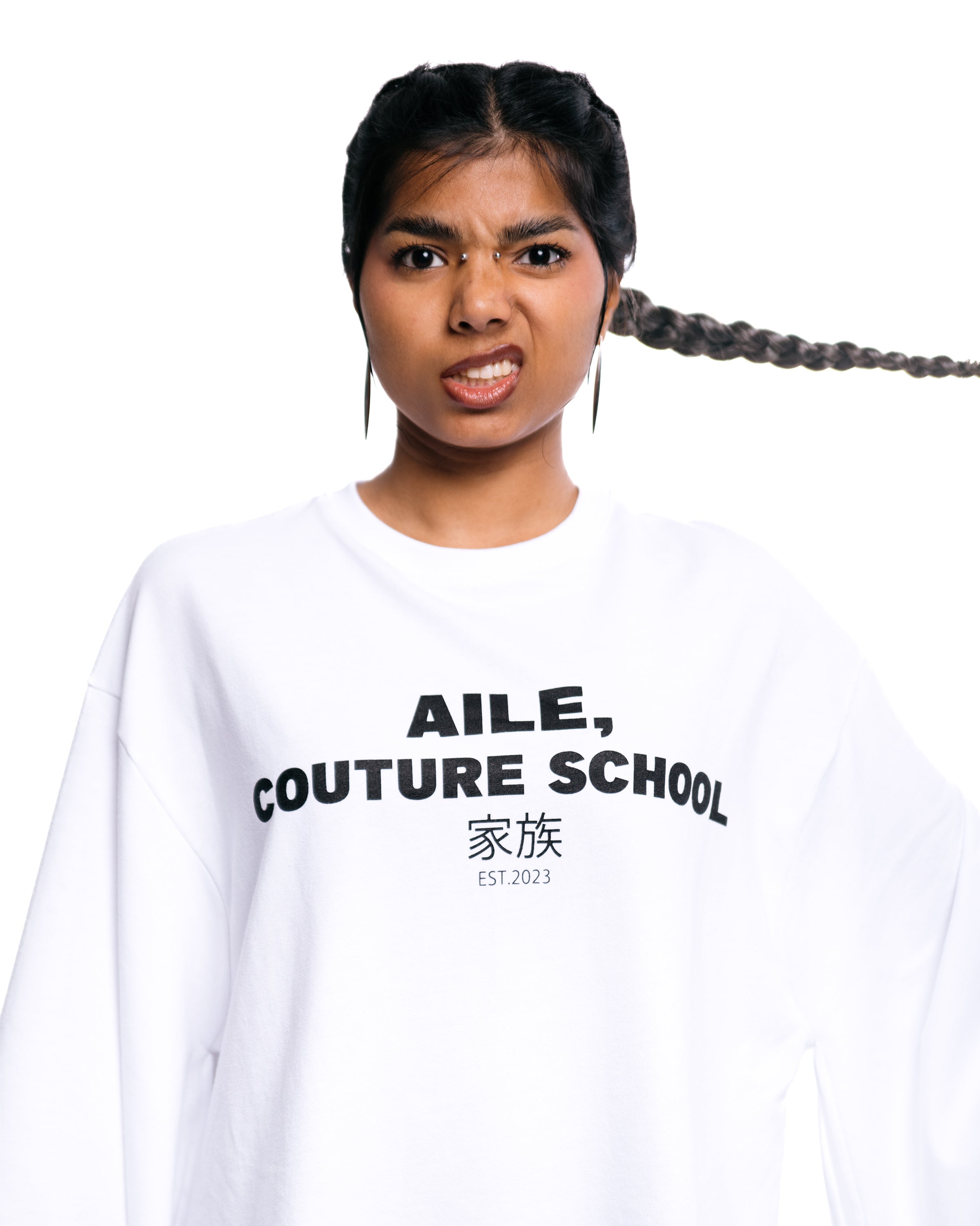 Detailed with an AILE COUTURE SCHOOL stamp logo.