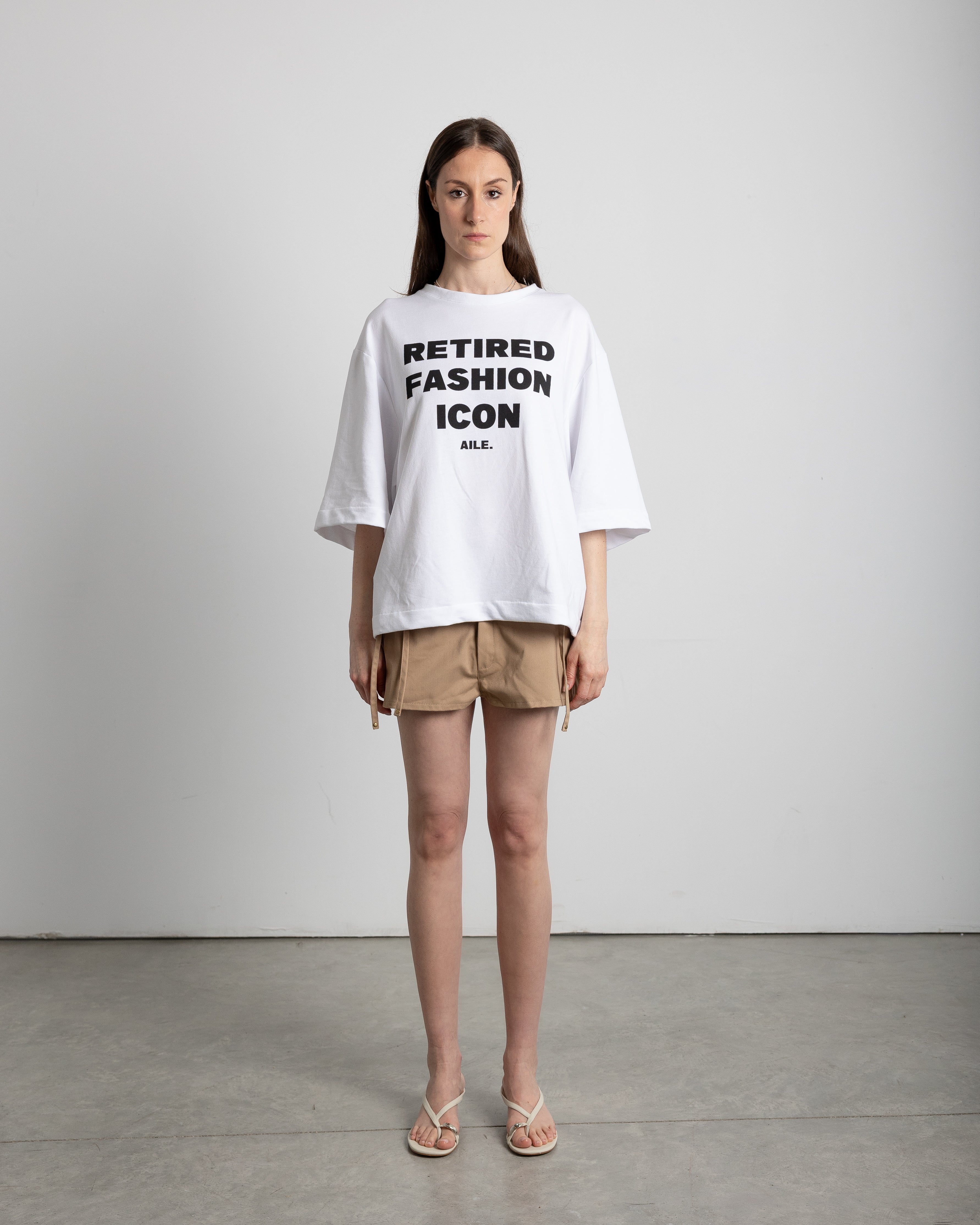 "RETIRED FASHION ICON" TEE
