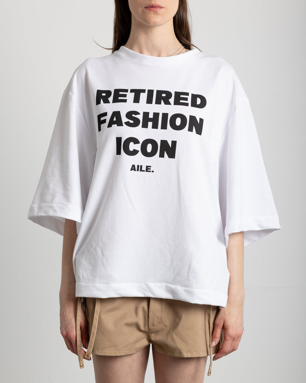 "RETIRED FASHION ICON" TEE