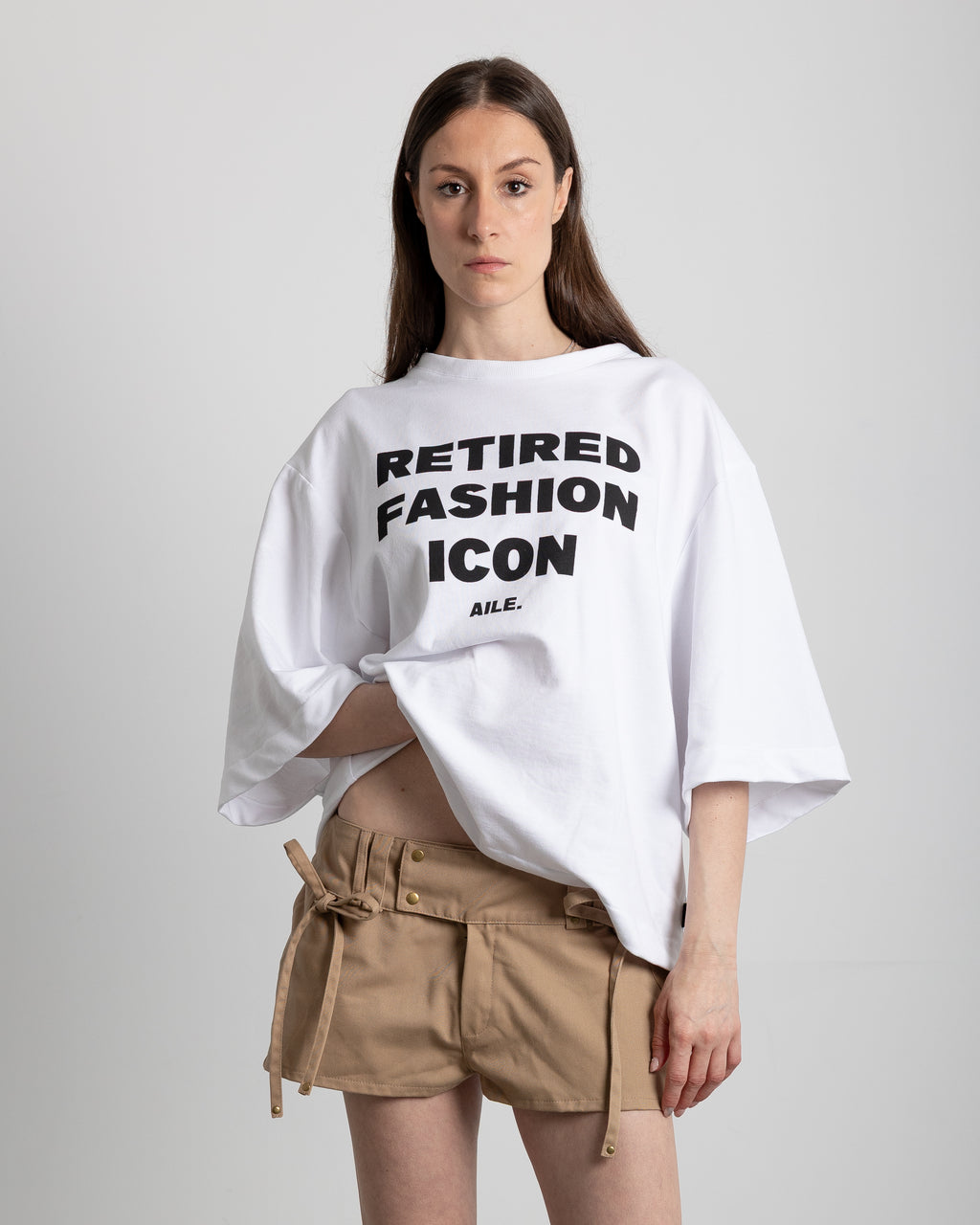 "RETIRED FASHION ICON" TEE